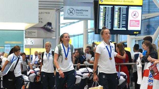England women arrive at Heathrow