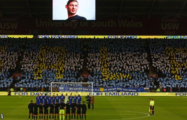 A mosaic in the national colours of the Argentine striker was displayed by fans during a minute's silence before the match