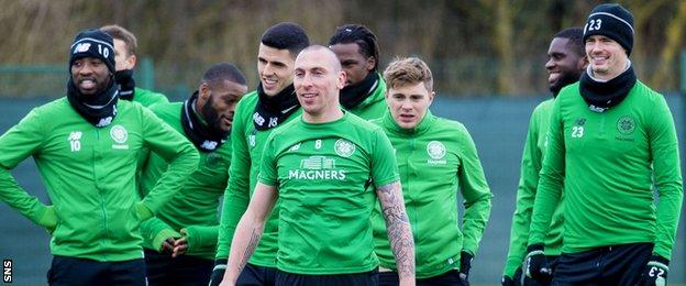 Celtic captain Scott Brown leads from the front in training