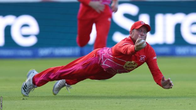 Roelof van der Merwe of Welsh Fire catches Moeen Ali of Birmingham Phoenix during The Hundred lucifer  betwixt  Birmingham Phoenix Men and Welsh Fire Men astatine  Edgbaston connected  August 10, 2023 successful  Birmingham, England.