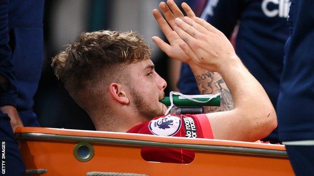 Harvey Elliott is stretchered off against Leeds