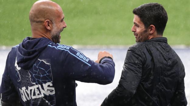 Pep Guardiola and Mikel Arteta on the sidelines at the Etihad Stadium