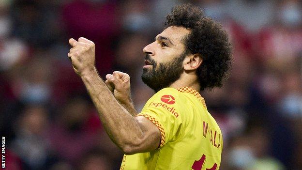 Salah celebrates against Atletico Madrid