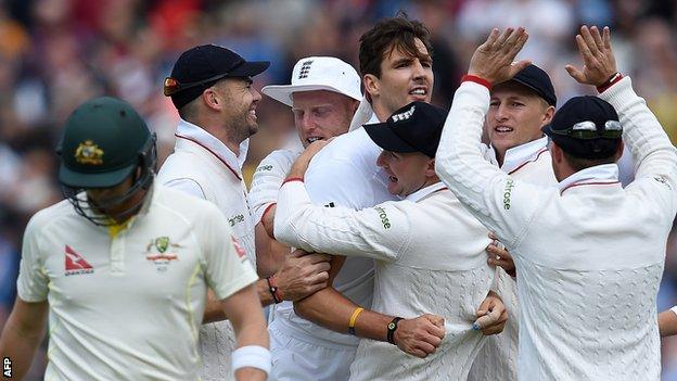 England celebrate a wicket for Steven Finn