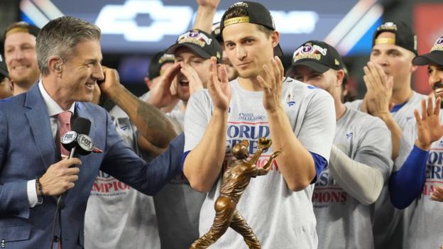 Corey Seager with the World Series MVP award