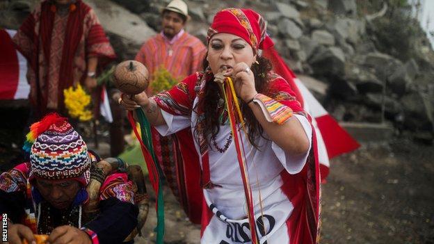 Peruvian shamans perform a ritual to help their national team in a World Cup play-off against Australia