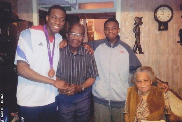 Lutalo Muhammad with his younger brother, grandfather and grandmother, pictured in 2012
