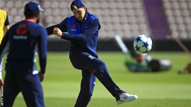 Joe Root shoots during an England training session