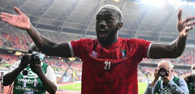Esteban Obiang celebrates after Equatorial Guinea beat Algeria