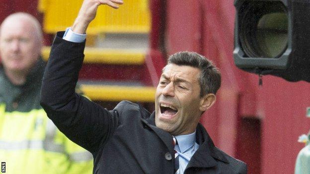 Pedro Caixinha makes a point to his Rangers side