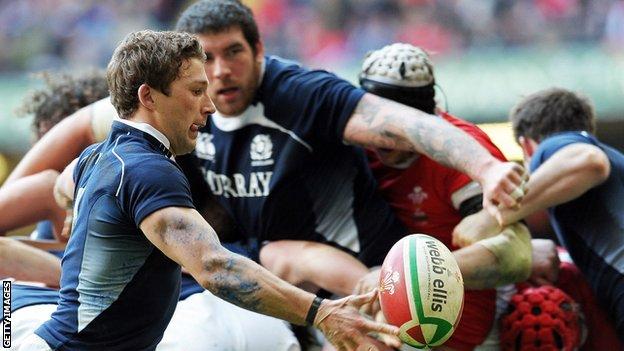 Chris Cussiter prepares to kick the ball for Scotland against Wales in 2010