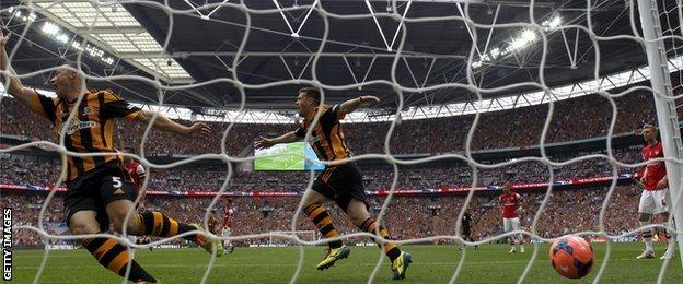 Matty Fryatt (centre) celebrates Hull City's second goal in their FA Cup defeat by Arsenal in 2014