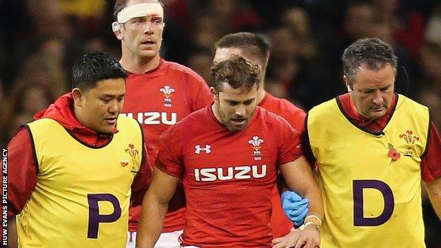 Leigh Halfpenny is helped off after suffering a blow to the head against Australia in November 2018
