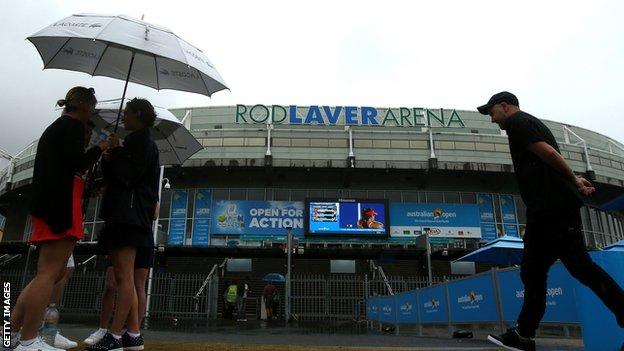 Rain has held up play on day five at the Australian Open