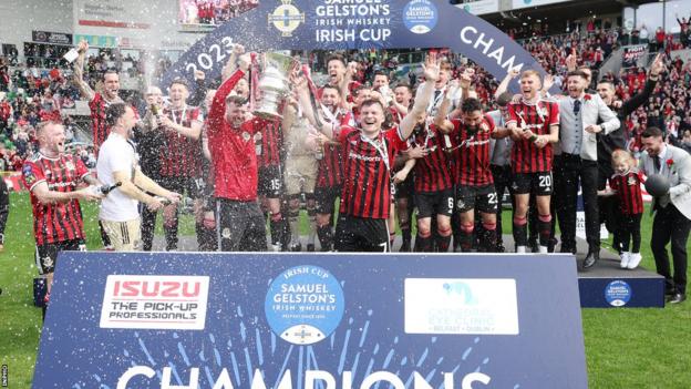 Crusaders beat Ballymena United in the Irish Cup final to qualify for Europe