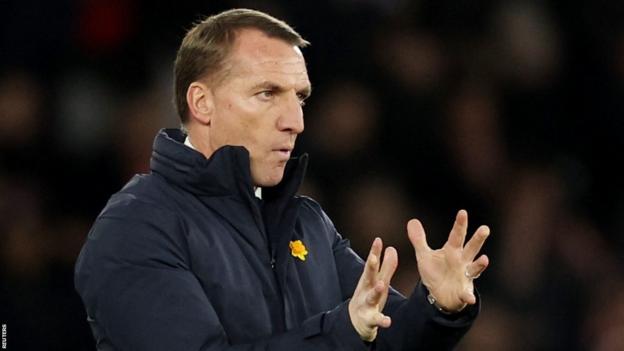 Leicester City manager Brendan Rodgers gestures to his players from the touchline