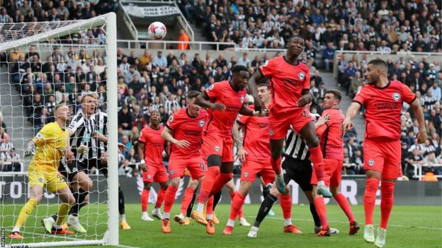 Brighton's Deniz Undav heads into his ain  nett  against Newcastle