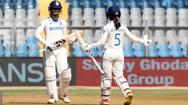 Jemima Rodrigues and Smriti Mandhana celebrate their maiden Test win over Australia