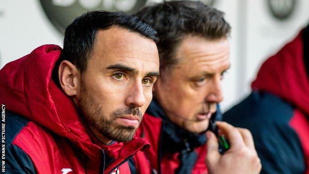 In his final season Leon Britton took a coaching role at the club for a month under former manager Paul Clement