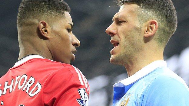 Demichelis (right) squares up to Manchester United striker Marcus Rashford