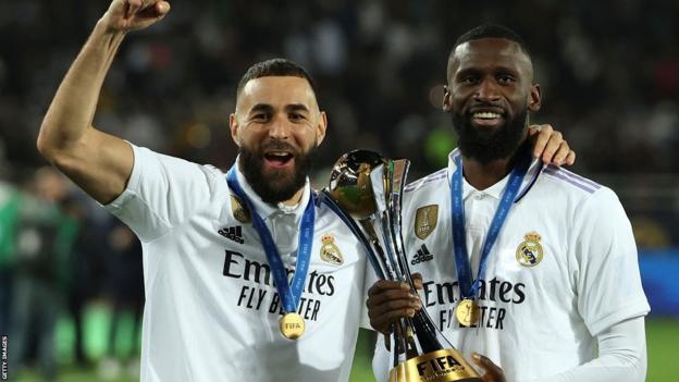 Real Madrid's Karim Benzema and Antonio Rudiger with the Fifa Club World Cup trophy