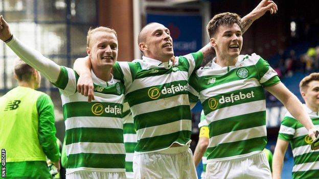 Leigh Griffiths, Scott Brown and Kieran Tierney celebrate Celtic's win at Ibrox