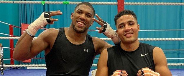 Anthony Joshua and Delicious Orie