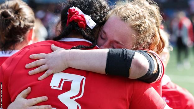 Abbie Fleming hugging Sisilia Tuipulotu