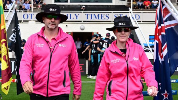 Wayne Knights and Kim Cotton walk out to the middle