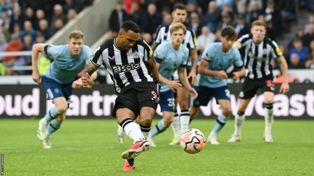 Newcastle striker Wilson scores from the penalty spot against Brentford