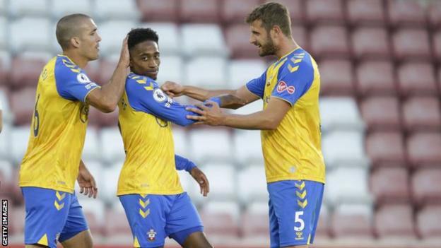 Kyle Walker-Peters celebrates his goal