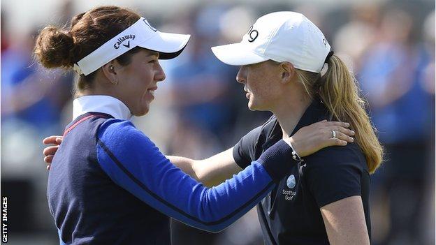 Georgia Hall and Louise Duncan hug after their second round of the Women's Open in Carnoustie