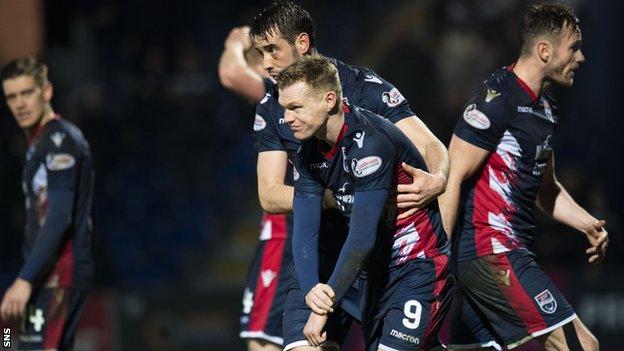 Ross County's Billy Mckay is in pain after scoring a hat-trick