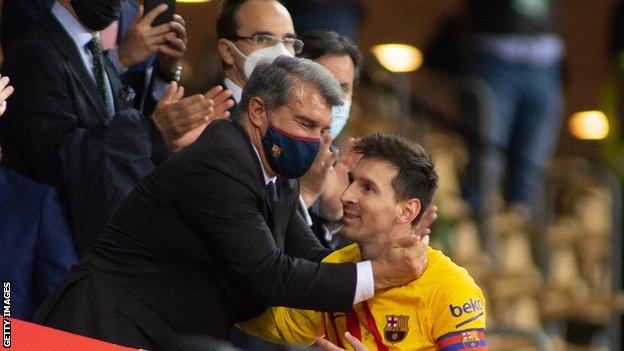 Joan Laporta and Lionel Messi