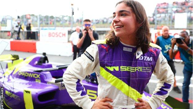 Jamie Chadwick smiling after winning the inaugural W Series title