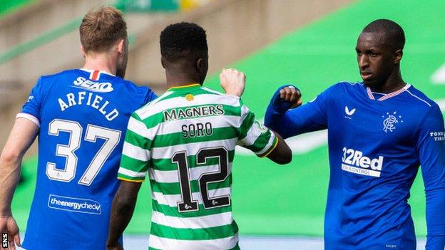 Rangers Scott Arfield, Celtic's Ismaila Soro and Rangers' Glen Kamara