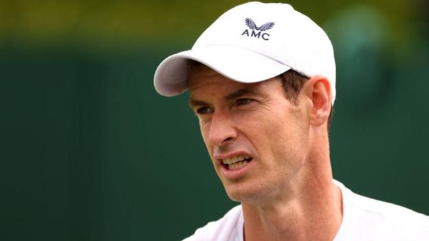 Andy Murray reacts during a practice session at Wimbledon