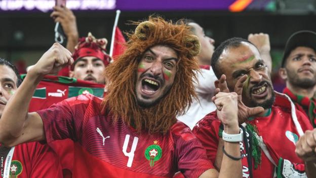 Morocco fans celebrate the win over Spain
