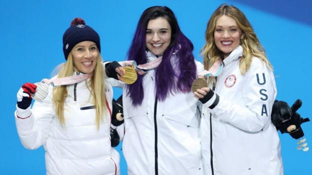 Cecile Hernandez, Brenna Huckaby and Amy Purdy with Paralympic silver, gold and bronze medals