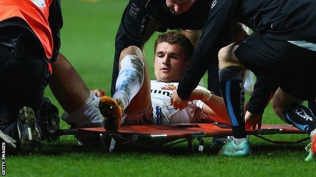 Henry Slade is stretchered off