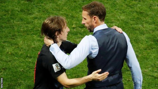 Luka Modric is congratulated by England manager Gareth Southgate