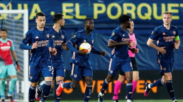 Arsenal players run back to the centre circle after Nicolas Pepe's scores against Villarreal