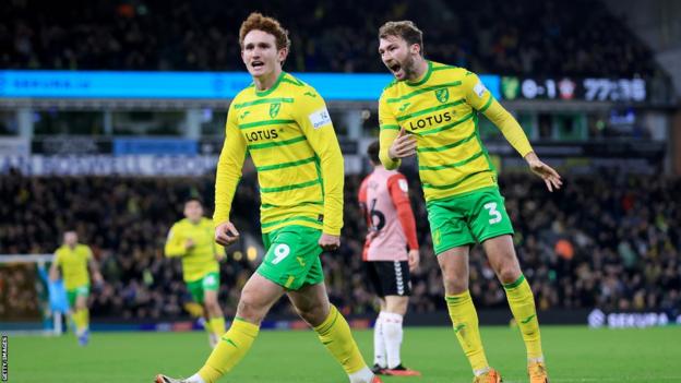 Josh Sargent (left) celebrates his goal for Norwich