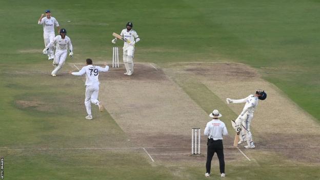 Tom Hartley celebrates final wicket