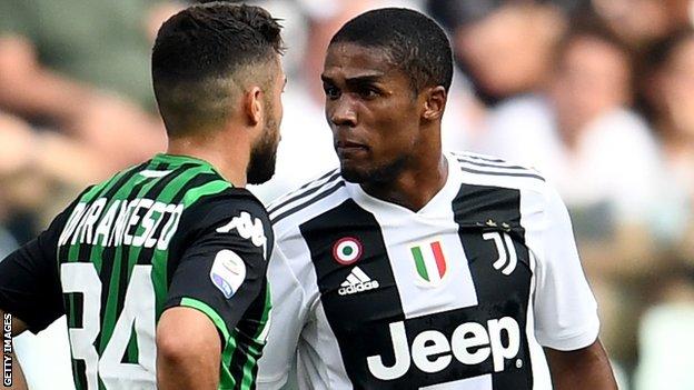 Douglas Costa Juventus Winger Banned For Four Games For Spitting Bbc Sport