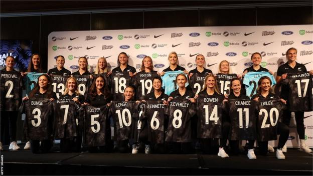 New Zealand's players with their shirts at the squad announcement for the 2023 Fifa Women's World Cup