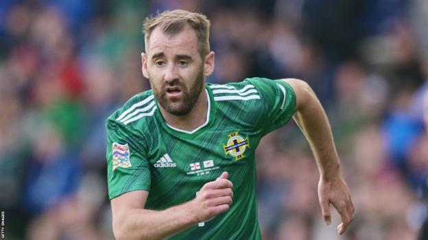 McGinn in action for Northern Ireland