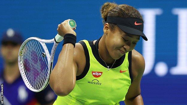 Serena Williams throws her racket after losing the second set tiebreak to  Victoria Azarenka of Belarus in the Woman's Final in Arthur Ashe Stadium at  the U.S. Open Tennis Championships at the