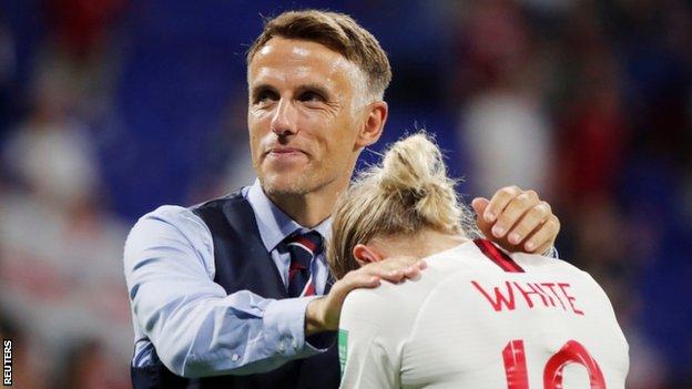 Phil Neville consoles Ellen White after the defeat but spoke of a brighter future