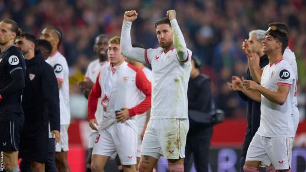 Sergio Ramos celebrates during a match for Sevilla